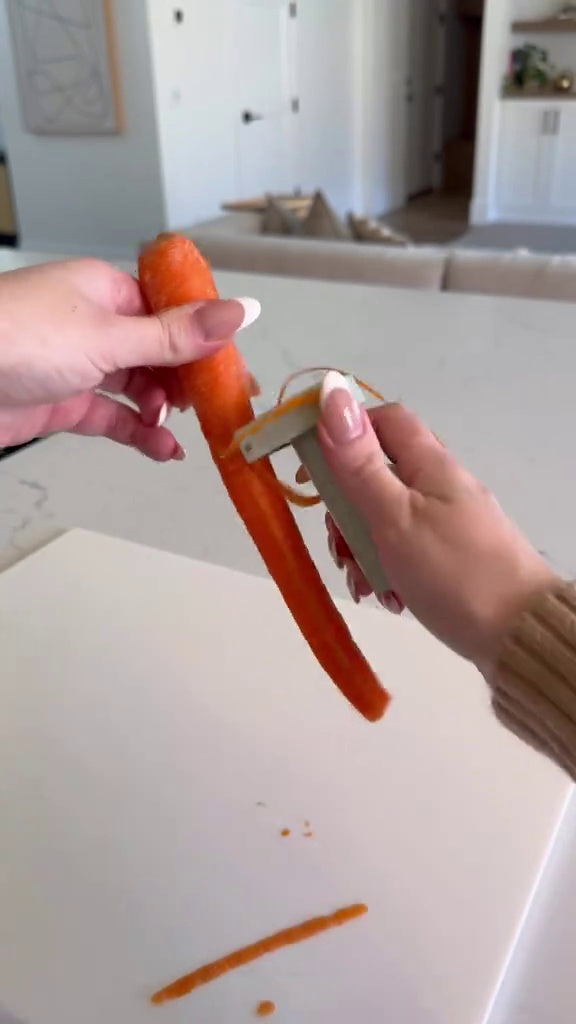 Éplucheur Poussoir Carotte